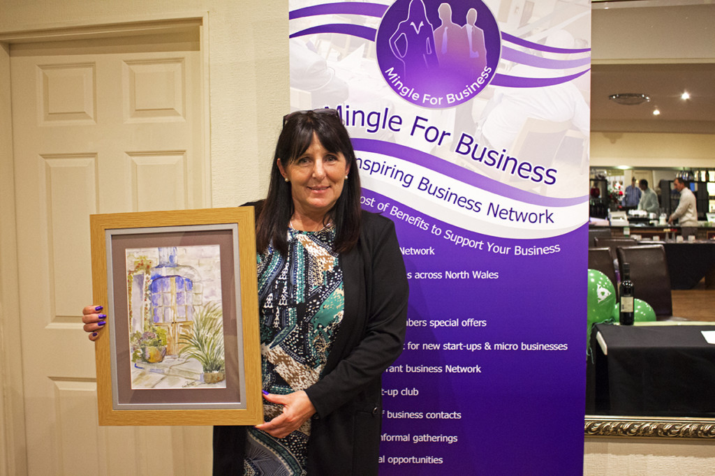 Sandra with her auction item she won.